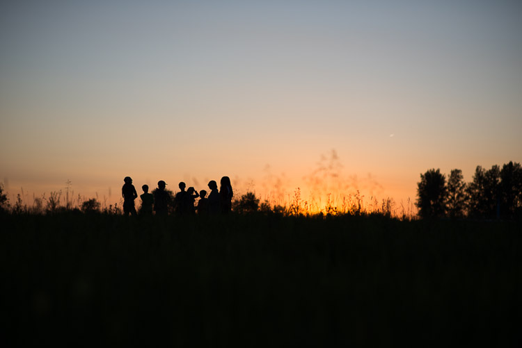 Children silhouettes at sunset.