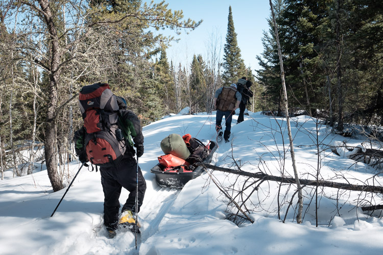 Trail hiking in for wild winter camping