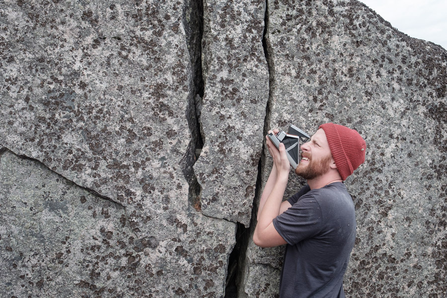 Fellow photographer Daniel Crump having fun with his classic Polaroid camera.