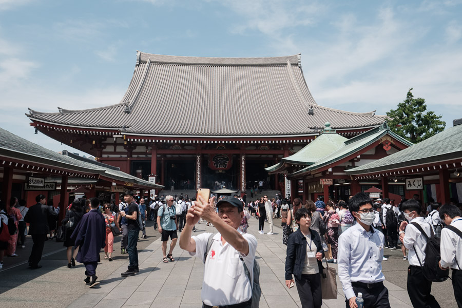 A modern moment in an old place. Technology and its overlap with long traditions is an interesting intersection. A spiritual heart is in the center of Tokyo…