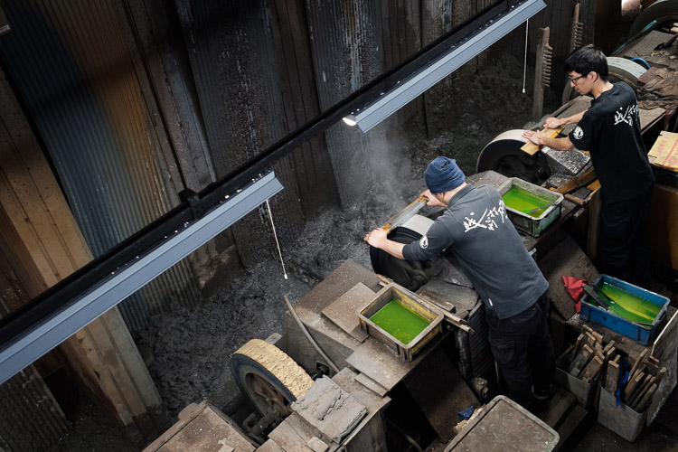 An apprentice watches his master closely as the local craft of knife making continues in the Echizen region of Japan.