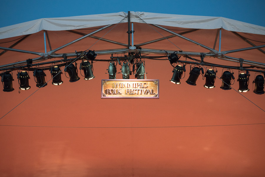 The iconic Winnipeg Folk Festival sign dangles above Main Stage.