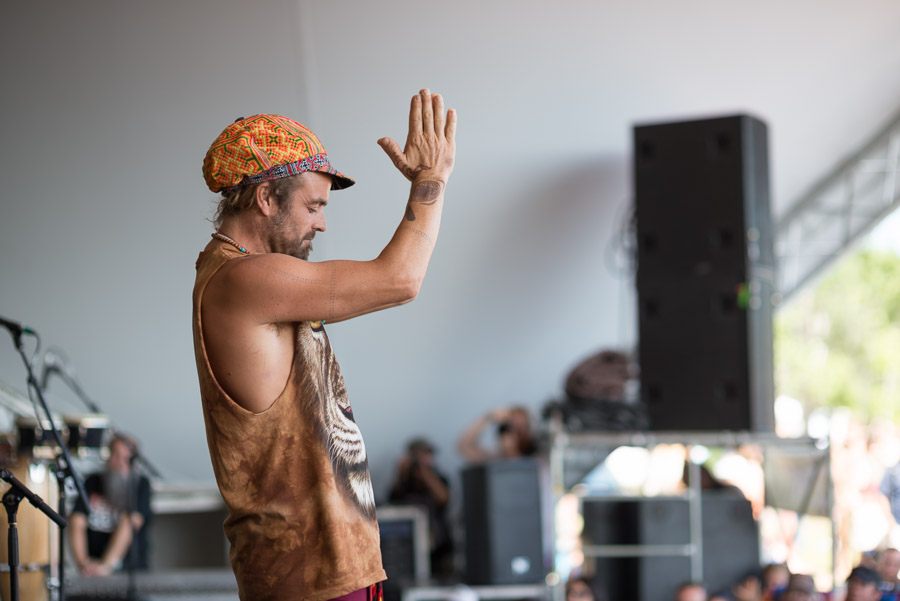 Xavier Rudd giving thanks to his audience; the appreciation is mutual.