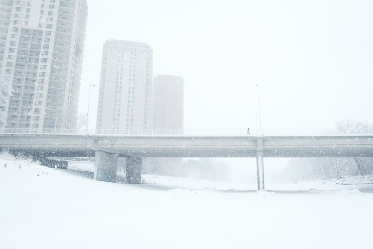 A winter storm arrives in the city.