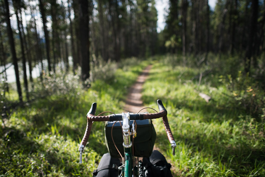 The view from the cockpit for a self-sufficient bicycle tourist; one which, pedal stroke after weary pedal stroke, never gets old.Context: Over several months of the 2015 summer, I embarked on a pedal powered bike tour through western Canada (Jasper, the Haida Gwaii, Vancouver Island, the Sunshine Coast, and Vancouver) - from building my bicycle to sleeping in hammocks every night. –link forthcoming–